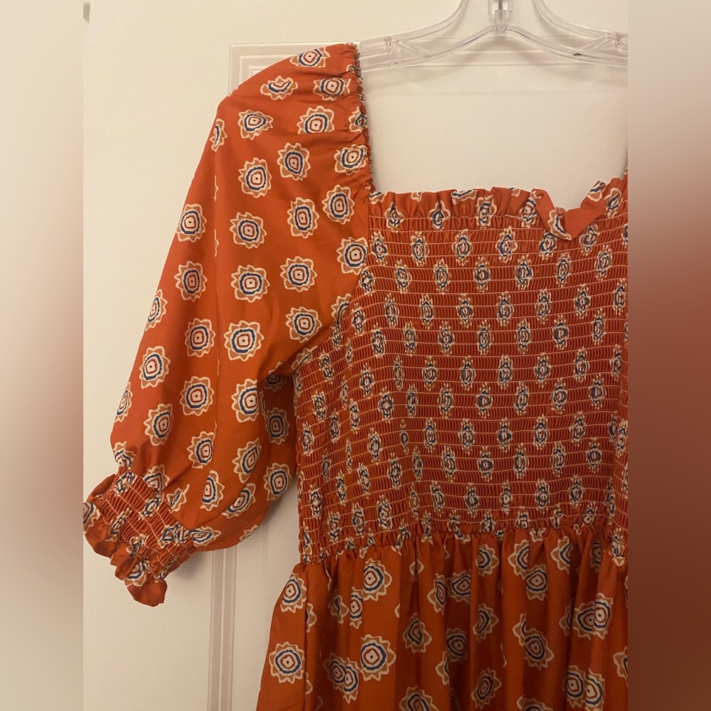 Orange Print Dress. Worn once - in like new condition.
